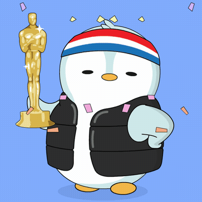A Cartoon Penguin Holding An Oscar Statue With Confetti Around It GIF