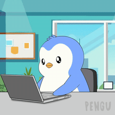 A Cartoon Penguin Is Sitting At A Desk With A Laptop GIF