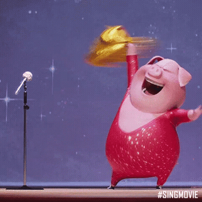 A Cartoon Pig Is Dancing In Front Of A Microphone With The Hashtag #Singmovie On The Bottom GIF