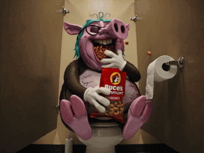 A Cartoon Pig Is Sitting On A Toilet With A Bag Of Buces In His Mouth GIF
