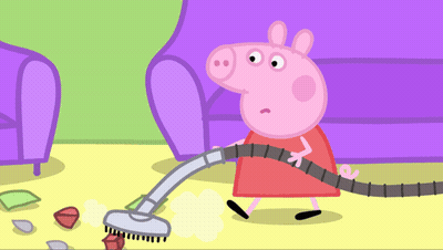 A Cartoon Pig Is Using A Vacuum Cleaner On The Floor GIF