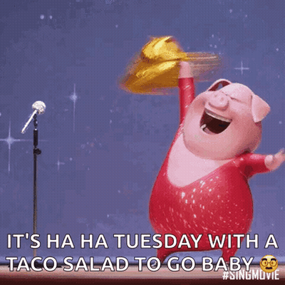 A Cartoon Pig Singing Into A Microphone While Holding A Taco Salad GIF