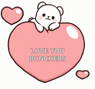 A Cartoon Polar Bear Is Sitting On Top Of A Pink Heart . GIF