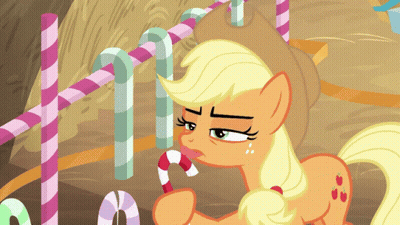 A Cartoon Pony Is Holding A Candy Cane In Its Mouth GIF