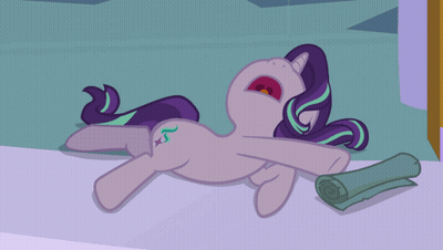 A Cartoon Pony Is Laying On The Floor With Its Mouth Wide Open GIF