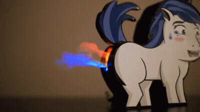 A Cartoon Pony With A Blue Tail And Red And Blue Smoke Coming Out Of Its Butt GIF
