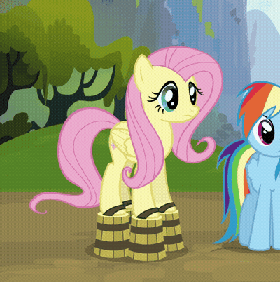 A Cartoon Pony With A Pink Mane Is Standing Next To A Rainbow Pony GIF