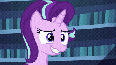 A Cartoon Pony With Purple Hair And A Horn Is Smiling In Front Of A Bookshelf GIF