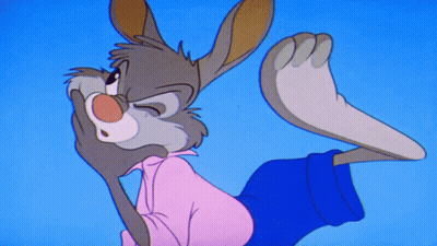 A Cartoon Rabbit In A Pink Shirt And Blue Shorts Covering His Mouth GIF