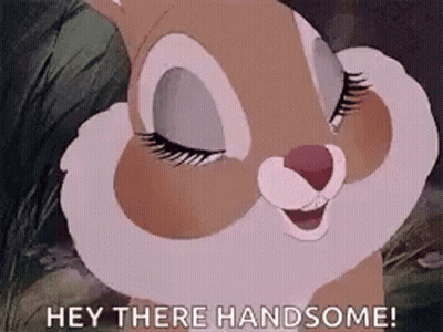 A Cartoon Rabbit Is Smiling With Its Eyes Closed And Saying `` Hey There Handsome ! '' GIF
