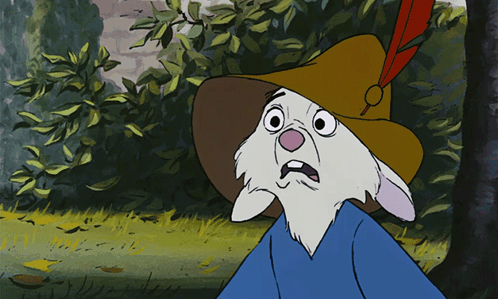 A Cartoon Rabbit Wearing A Hat With A Red Feather GIF