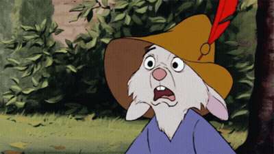 A Cartoon Rabbit Wearing A Yellow Hat With A Red Feather On Top GIF
