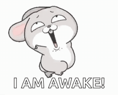 A Cartoon Rabbit With Its Mouth Open And The Words `` I Am Awake '' Written Below It . GIF