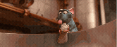 A Cartoon Rat Is Holding A Piece Of Food In Its Paws GIF