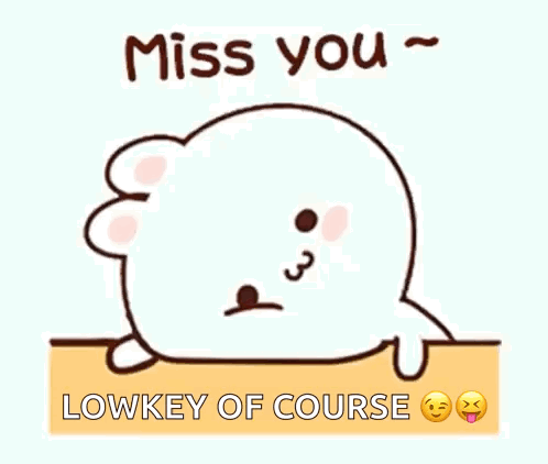 A Cartoon Seal Is Laying On The Ground With The Words `` Miss You '' Written On It . GIF