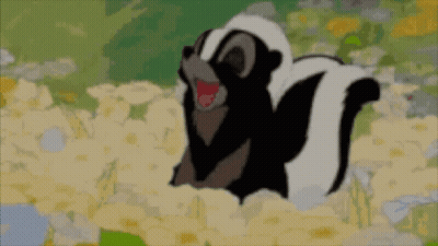 A Cartoon Skunk Is Sitting In A Field Of Flowers With Its Mouth Open GIF
