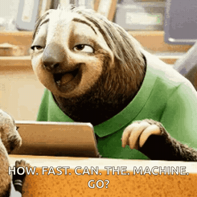 A Cartoon Sloth Is Sitting At A Table With A Tablet And Says How Fast Can The Machine Go GIF