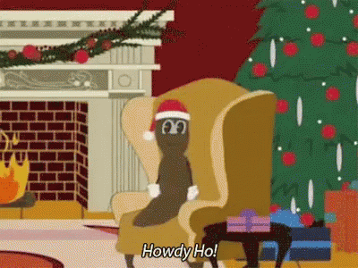 A Cartoon Sloth Wearing A Santa Hat Is Sitting In A Chair GIF