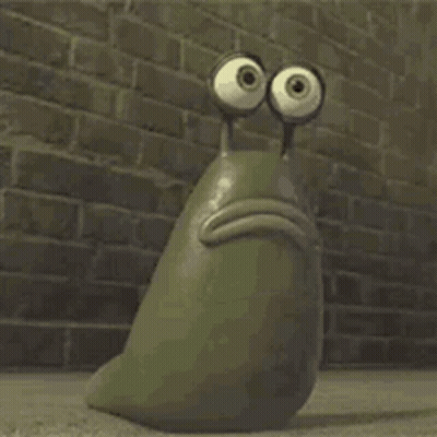 A Cartoon Snail With Big Eyes Is Sitting In Front Of A Brick Wall . GIF
