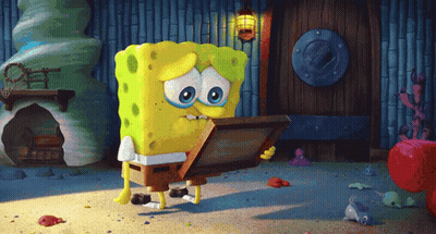 A Cartoon Spongebob Holding A Picture In His Hand GIF