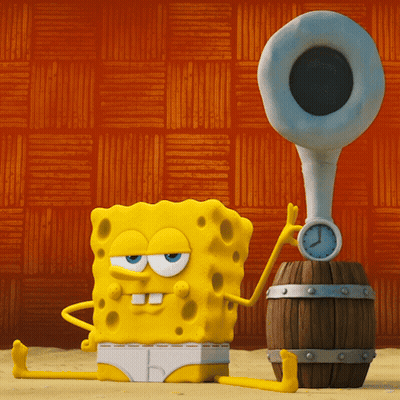 A Cartoon Spongebob Is Sitting Next To A Barrel And A Clock GIF