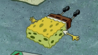 A Cartoon Spongebob Squarepants Character Is Laying On His Back On The Ground GIF