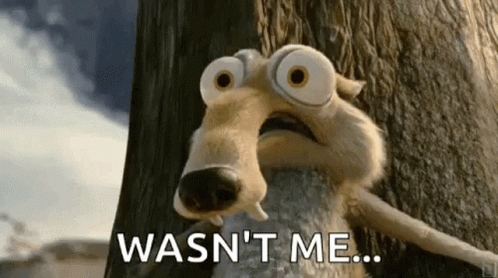 A Cartoon Squirrel Is Standing Next To A Tree And Says `` Wasn 'T Me ... '' . GIF