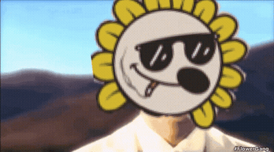 A Cartoon Sunflower Wearing Sunglasses And A Cigarette GIF