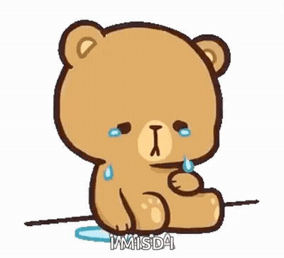 A Cartoon Teddy Bear Is Crying And Holding A Flower In His Hand . GIF
