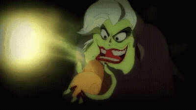 A Cartoon Witch Is Holding A Light In Her Hand And Smiling . GIF