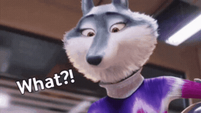A Cartoon Wolf Is Standing In A Room And Says What ? GIF