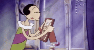 A Cartoon Woman Is Holding A Framed Picture Of Herself . GIF
