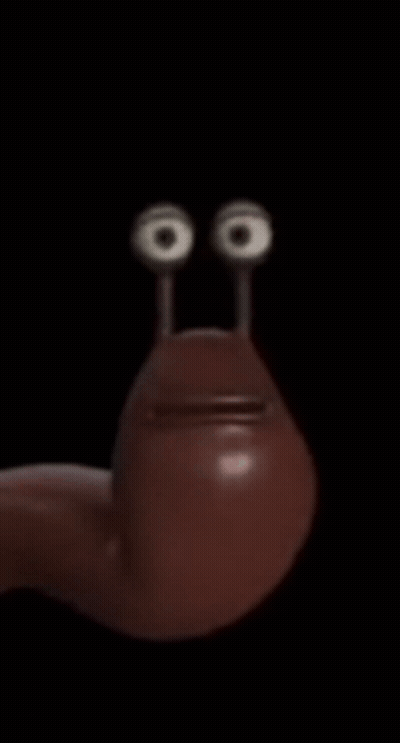A Cartoon Worm With Two Eyes And A Mouth GIF
