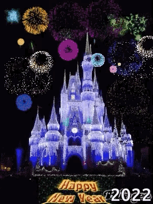 A Castle Is Lit Up With Fireworks And Says Happy New Year GIF