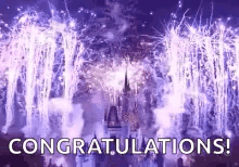 A Castle Is Surrounded By Fireworks And The Words `` Congratulations '' Are Displayed . GIF
