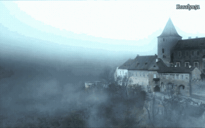 A Castle Is Surrounded By Fog And The Name Rosalyn61 Is On The Bottom Of The Screen GIF