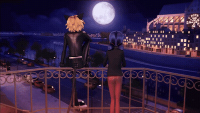 A Cat And A Girl Are Standing On A Balcony Looking At The Full Moon GIF
