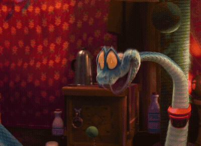 A Cat And A Snake Standing Next To Each Other GIF