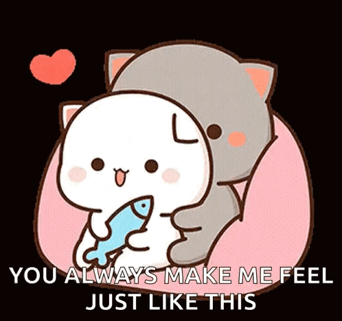 A Cat Is Hugging A White Cat With A Fish In Its Mouth . GIF