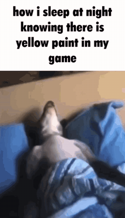 A Cat Is Laying On A Bed With The Words `` How I Sleep At Night Knowing There Is Yellow Paint In My Game '' Written On I GIF