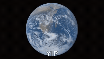 A Cat Is Looking At The Earth With The Words Yip Written In Front Of It GIF