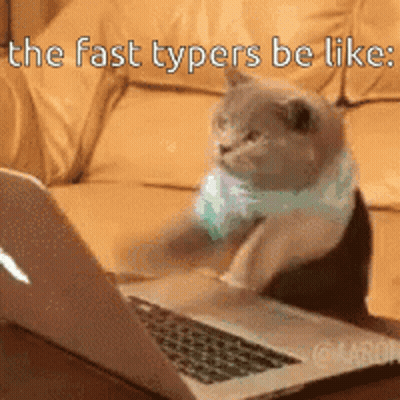 A Cat Sitting In Front Of A Laptop With The Words " The Fast Typers Be Like " GIF