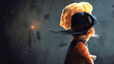 A Cat Wearing A Black Hat With A Yellow Feather On It GIF