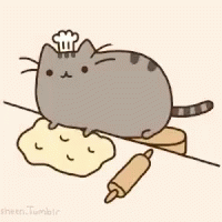 A Cat Wearing A Chef Hat Is Sitting On A Pile Of Dough GIF