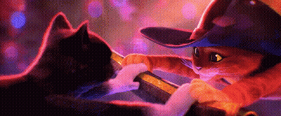 A Cat Wearing A Cowboy Hat Is Playing With Another Cat GIF