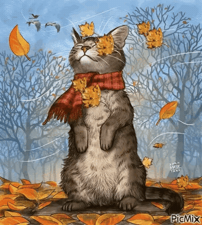 A Cat Wearing A Scarf And Leaves On Its Face Is Standing In A Pile Of Leaves In A Forest . GIF