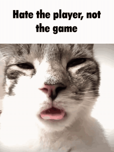 A Cat With Its Tongue Sticking Out And The Words Hate The Player Not The Game Above It GIF