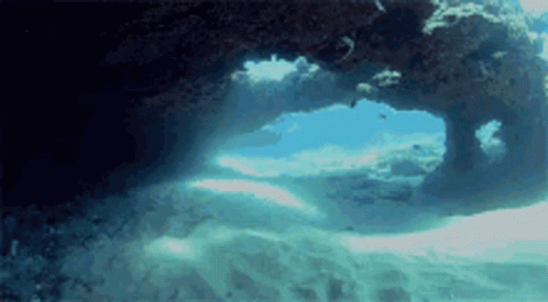 Ocean Cave With Sunlight Shining Through GIF