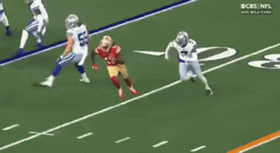 A Cbs Nfl Wild Card Game Is Being Played On A Football Field GIF