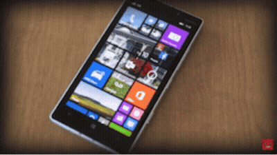 A Cell Phone Displays A Grid Of Icons Including One That Says ' A ' On It GIF